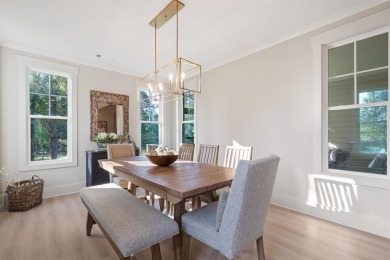 Experience the perfect blend of elegance & modern comfort in on Harbor Club Golf and Country Club in Georgia - for sale on GolfHomes.com, golf home, golf lot