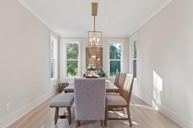 Experience the perfect blend of elegance & modern comfort in on Harbor Club Golf and Country Club in Georgia - for sale on GolfHomes.com, golf home, golf lot