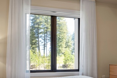 Discover mountain-modern luxury with this stunning 2-bedroom on Osprey Meadows at Tamarack Resort in Idaho - for sale on GolfHomes.com, golf home, golf lot