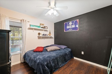 Discover this beautifully updated 4-bedroom, 2-bath home with a on Lexington Oaks Golf Club in Florida - for sale on GolfHomes.com, golf home, golf lot