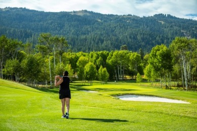 Discover mountain-modern luxury with this stunning 2-bedroom on Osprey Meadows at Tamarack Resort in Idaho - for sale on GolfHomes.com, golf home, golf lot