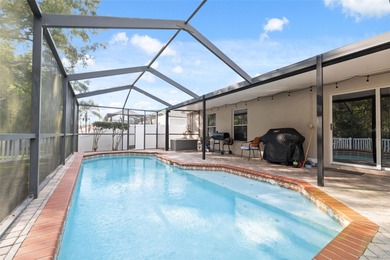 Discover this beautifully updated 4-bedroom, 2-bath home with a on Lexington Oaks Golf Club in Florida - for sale on GolfHomes.com, golf home, golf lot