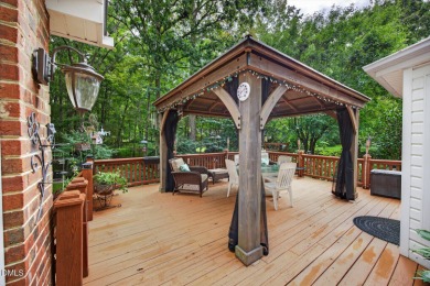 Nature Enthusiasts Take Notice! Nestled on a quiet cul-de-sac in on Forest Oaks Country Club in North Carolina - for sale on GolfHomes.com, golf home, golf lot