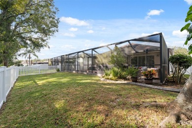 Discover this beautifully updated 4-bedroom, 2-bath home with a on Lexington Oaks Golf Club in Florida - for sale on GolfHomes.com, golf home, golf lot