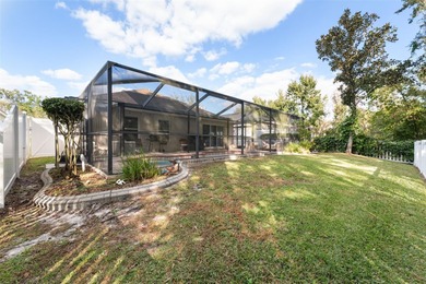 Discover this beautifully updated 4-bedroom, 2-bath home with a on Lexington Oaks Golf Club in Florida - for sale on GolfHomes.com, golf home, golf lot