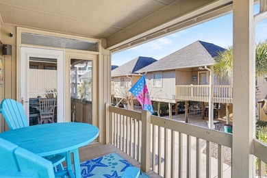 This beautiful four-bedroom, three-bath raised beach home is on The Dunes Golf and Beach Club in South Carolina - for sale on GolfHomes.com, golf home, golf lot