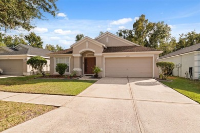 Discover this beautifully updated 4-bedroom, 2-bath home with a on Lexington Oaks Golf Club in Florida - for sale on GolfHomes.com, golf home, golf lot