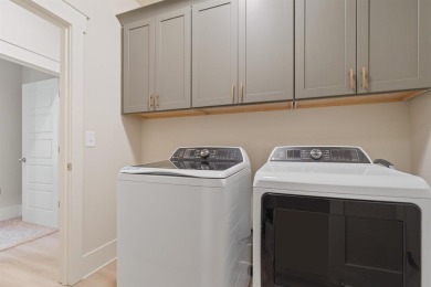 Experience the perfect blend of elegance & modern comfort in on Harbor Club Golf and Country Club in Georgia - for sale on GolfHomes.com, golf home, golf lot