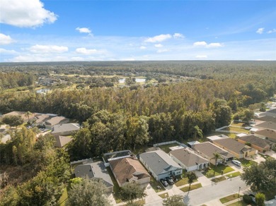 Discover this beautifully updated 4-bedroom, 2-bath home with a on Lexington Oaks Golf Club in Florida - for sale on GolfHomes.com, golf home, golf lot