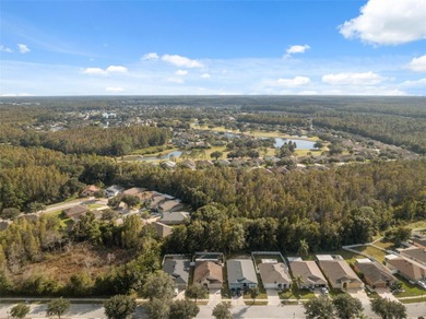 Discover this beautifully updated 4-bedroom, 2-bath home with a on Lexington Oaks Golf Club in Florida - for sale on GolfHomes.com, golf home, golf lot