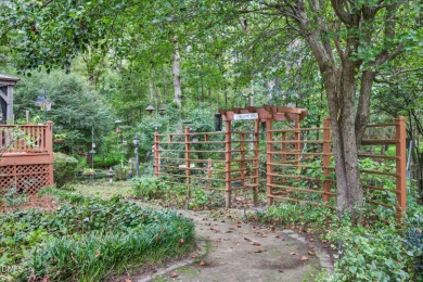 Nature Enthusiasts Take Notice! Nestled on a quiet cul-de-sac in on Forest Oaks Country Club in North Carolina - for sale on GolfHomes.com, golf home, golf lot