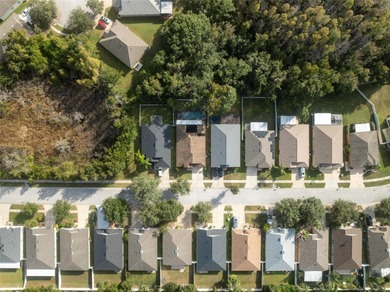 Discover this beautifully updated 4-bedroom, 2-bath home with a on Lexington Oaks Golf Club in Florida - for sale on GolfHomes.com, golf home, golf lot