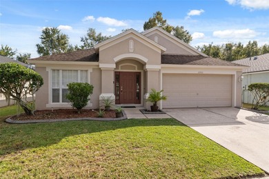 Discover this beautifully updated 4-bedroom, 2-bath home with a on Lexington Oaks Golf Club in Florida - for sale on GolfHomes.com, golf home, golf lot