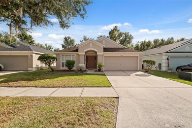 Discover this beautifully updated 4-bedroom, 2-bath home with a on Lexington Oaks Golf Club in Florida - for sale on GolfHomes.com, golf home, golf lot