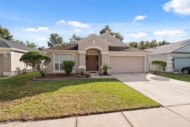 Discover this beautifully updated 4-bedroom, 2-bath home with a on Lexington Oaks Golf Club in Florida - for sale on GolfHomes.com, golf home, golf lot