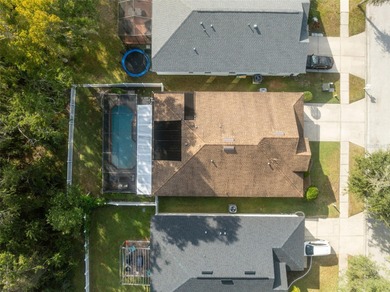 Discover this beautifully updated 4-bedroom, 2-bath home with a on Lexington Oaks Golf Club in Florida - for sale on GolfHomes.com, golf home, golf lot