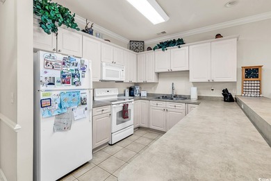 Enjoy gorgeous water views from this beautifully positioned on Myrtlewood Golf Course and Club  in South Carolina - for sale on GolfHomes.com, golf home, golf lot