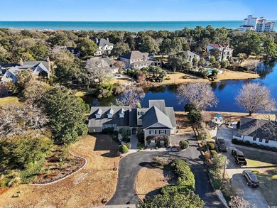 Welcome to 24 Chapin Circle, a remarkable lakefront home located on The Dunes Golf and Beach Club in South Carolina - for sale on GolfHomes.com, golf home, golf lot