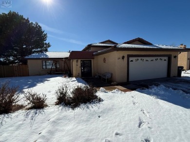 Great Tri - level Pueblo West home located on 10th hole of the on Desert Hawk At Pueblo West in Colorado - for sale on GolfHomes.com, golf home, golf lot