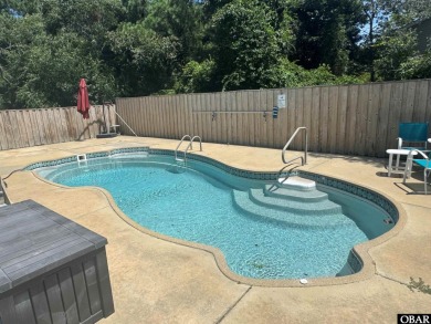This beautifully updated and versatile coastal retreat offers on Duck Woods Country Club in North Carolina - for sale on GolfHomes.com, golf home, golf lot