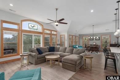 This beautifully updated and versatile coastal retreat offers on Duck Woods Country Club in North Carolina - for sale on GolfHomes.com, golf home, golf lot