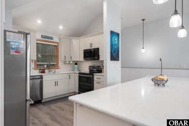 This beautifully updated and versatile coastal retreat offers on Duck Woods Country Club in North Carolina - for sale on GolfHomes.com, golf home, golf lot