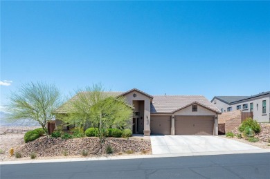 This pristine 2,008 square foot home backs up to the golf course on Laughlin Ranch Golf Club in Arizona - for sale on GolfHomes.com, golf home, golf lot
