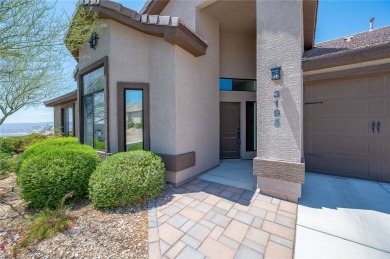 This pristine 2,008 square foot home backs up to the golf course on Laughlin Ranch Golf Club in Arizona - for sale on GolfHomes.com, golf home, golf lot