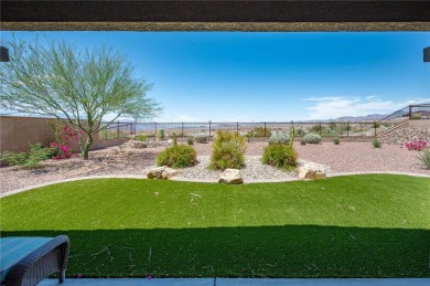 This pristine 2,008 square foot home backs up to the golf course on Laughlin Ranch Golf Club in Arizona - for sale on GolfHomes.com, golf home, golf lot