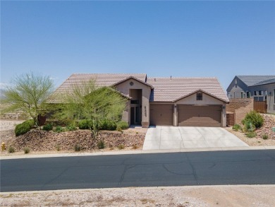 This pristine 2,008 square foot home backs up to the golf course on Laughlin Ranch Golf Club in Arizona - for sale on GolfHomes.com, golf home, golf lot
