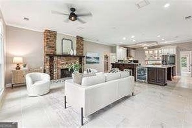 Tucked in Atlanta Country Club's quiet interior, this refreshed on Atlanta Country Club in Georgia - for sale on GolfHomes.com, golf home, golf lot