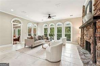 Tucked in Atlanta Country Club's quiet interior, this refreshed on Atlanta Country Club in Georgia - for sale on GolfHomes.com, golf home, golf lot