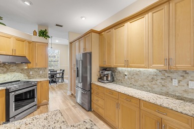 Tucked inside the sought-after community of Halifax Plantation on Halifax Plantation Golf Club in Florida - for sale on GolfHomes.com, golf home, golf lot