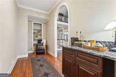 Tucked in Atlanta Country Club's quiet interior, this refreshed on Atlanta Country Club in Georgia - for sale on GolfHomes.com, golf home, golf lot