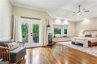 Tucked in Atlanta Country Club's quiet interior, this refreshed on Atlanta Country Club in Georgia - for sale on GolfHomes.com, golf home, golf lot