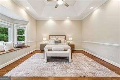 Tucked in Atlanta Country Club's quiet interior, this refreshed on Atlanta Country Club in Georgia - for sale on GolfHomes.com, golf home, golf lot