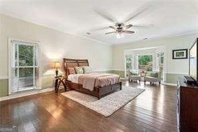 Tucked in Atlanta Country Club's quiet interior, this refreshed on Atlanta Country Club in Georgia - for sale on GolfHomes.com, golf home, golf lot