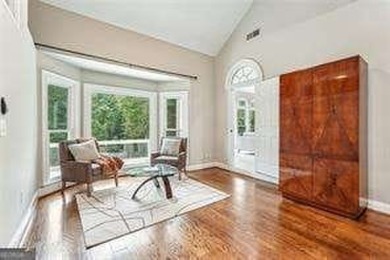 Tucked in Atlanta Country Club's quiet interior, this refreshed on Atlanta Country Club in Georgia - for sale on GolfHomes.com, golf home, golf lot