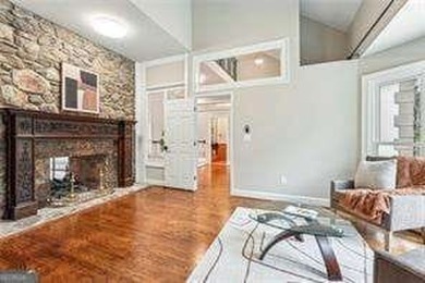 Tucked in Atlanta Country Club's quiet interior, this refreshed on Atlanta Country Club in Georgia - for sale on GolfHomes.com, golf home, golf lot