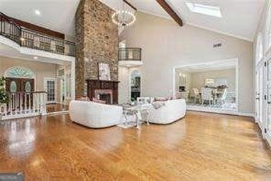 Tucked in Atlanta Country Club's quiet interior, this refreshed on Atlanta Country Club in Georgia - for sale on GolfHomes.com, golf home, golf lot