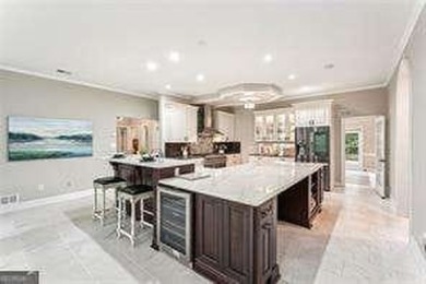 Tucked in Atlanta Country Club's quiet interior, this refreshed on Atlanta Country Club in Georgia - for sale on GolfHomes.com, golf home, golf lot