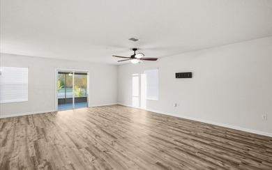 Located in the golf-cart-friendly Grand Reserve Golf Community on Grand Reserve Golf Course in Florida - for sale on GolfHomes.com, golf home, golf lot