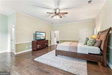 Tucked in Atlanta Country Club's quiet interior, this refreshed on Atlanta Country Club in Georgia - for sale on GolfHomes.com, golf home, golf lot