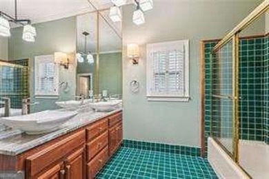 Tucked in Atlanta Country Club's quiet interior, this refreshed on Atlanta Country Club in Georgia - for sale on GolfHomes.com, golf home, golf lot