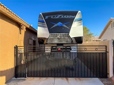 PARKING! PARKING! PARKING! Nestled in the desirable neighborhood on Desert Lakes Golf Course in Arizona - for sale on GolfHomes.com, golf home, golf lot