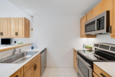Popular D model townhome with a lovely courtyard in Kings Way on The Club At Yarmouthport in Massachusetts - for sale on GolfHomes.com, golf home, golf lot