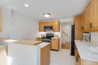 Popular D model townhome with a lovely courtyard in Kings Way on The Club At Yarmouthport in Massachusetts - for sale on GolfHomes.com, golf home, golf lot