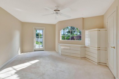 Lovely 5-bedroom + office home with southern exposure, located on St. Andrews Country Club of Boca Raton in Florida - for sale on GolfHomes.com, golf home, golf lot