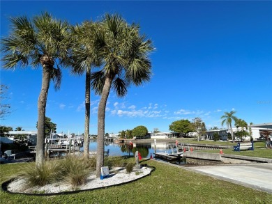 Watch the manatee and dolphin from your dock!!!  This home on Mangrove Bay Golf Course in Florida - for sale on GolfHomes.com, golf home, golf lot