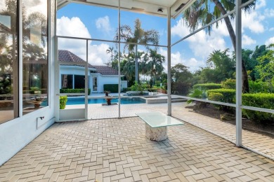 Lovely 5-bedroom + office home with southern exposure, located on St. Andrews Country Club of Boca Raton in Florida - for sale on GolfHomes.com, golf home, golf lot